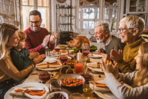 multi-generational-family-eating-thanksgiving-dinner